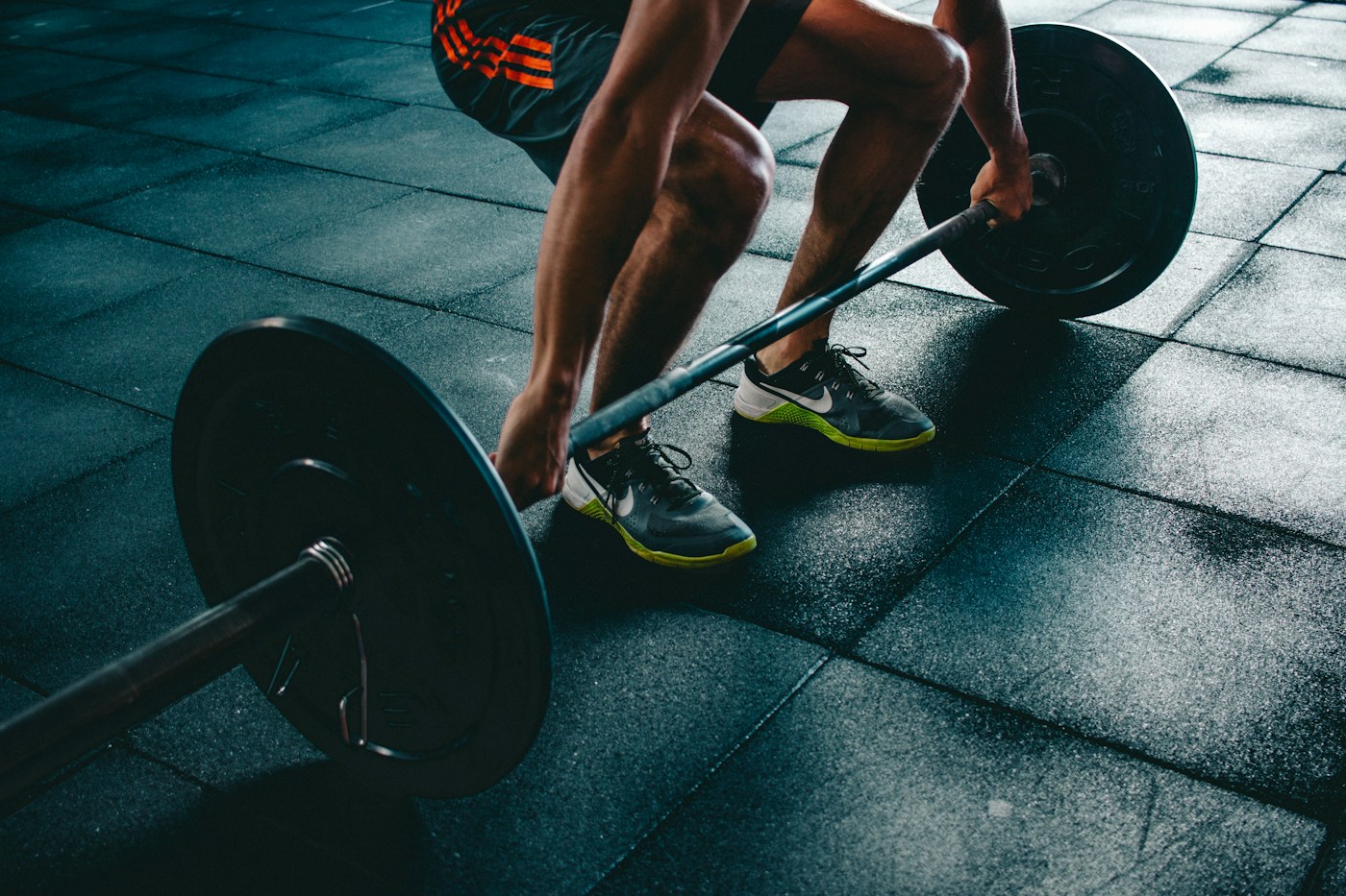 An athlete preparing a barbell lift